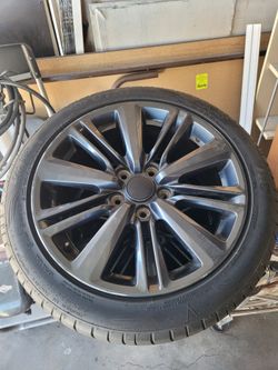A sport 17" wheels and 5000 miles old tires the nuts size I 5X114.3