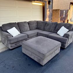 Gray Sectional Couch With Huge Ottoman And Storage