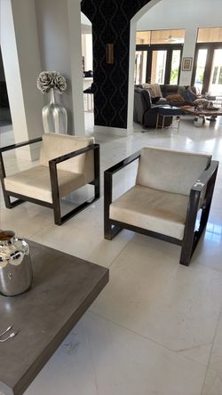 2 Cow Hide Chairs