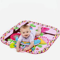 Baby pink floor gym with toys