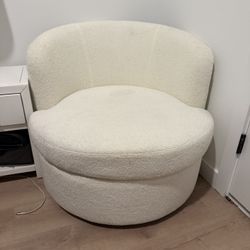 White Boucle Swivel Chair With Pillow