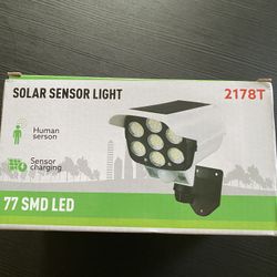 Solar Powered Wall Mounted Outdoor Light With Motion Detection & Remote Control