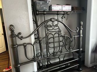 Antique metal bed queen sized