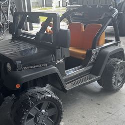 Jeep Wrangler Freedom Ride-On Toy Car with Fog Lights and Sounds - 12 Volt Power Wheels