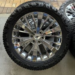 22x9 Chevy factory 22 inch wheels with 33x12.5 tires