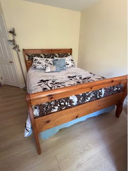 Sturdy queen  size wooden sleigh bed