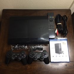 PS3 Console With 2 Controllers And 1 Remote