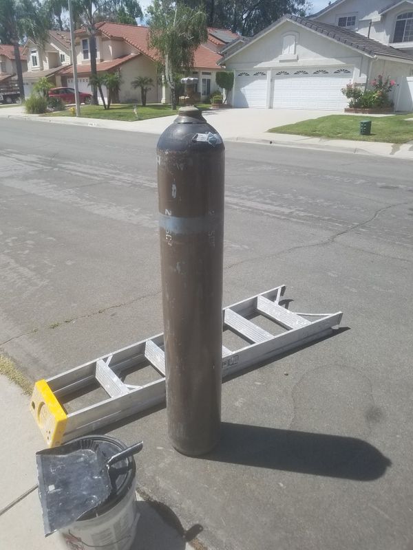 Welding tank 5feet tall almost full helim for Sale in Anaheim, CA OfferUp