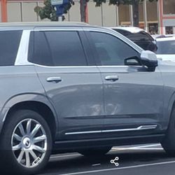 CADILLAC ESCALADE WHEELS (contact info removed) 80 % TIRES BRIDGESTONE 