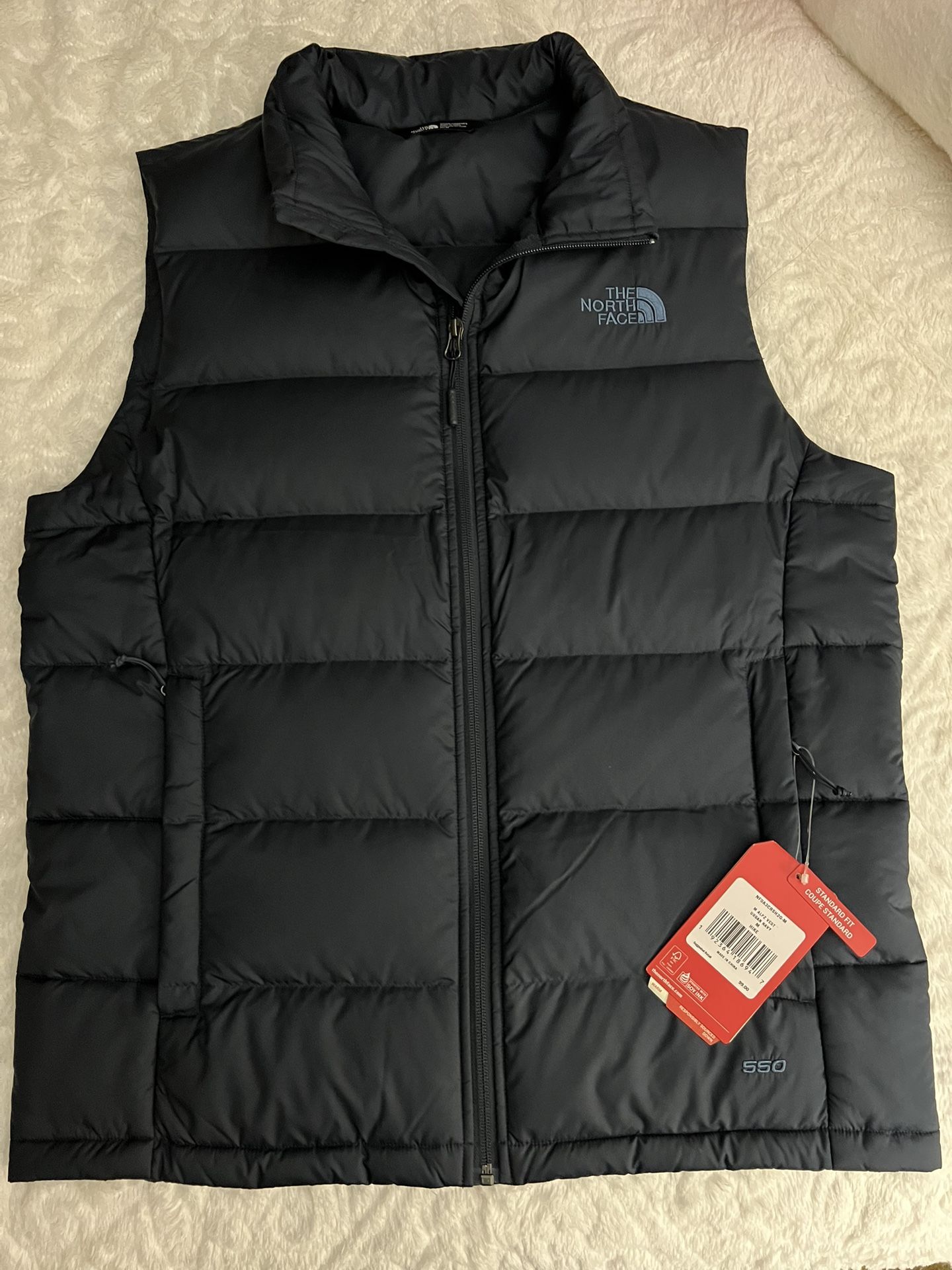 North Face Puffer Vests