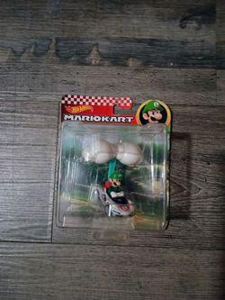 the Hot Wheels Mario Kart Luigi in P-Wing Kart with Cloud Glider