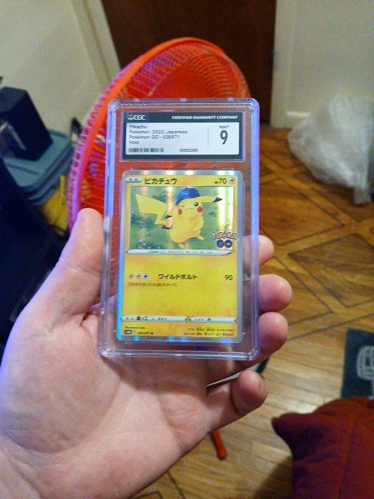 Pokémon card grade 9.