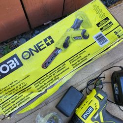 Ryobi two tool set , belt sander, drill battery and Charger. 
