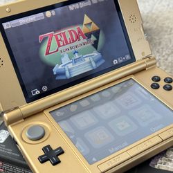 Nintendo 3DS XL Zelda Edition + Zelda Link Between Two Worlds Game