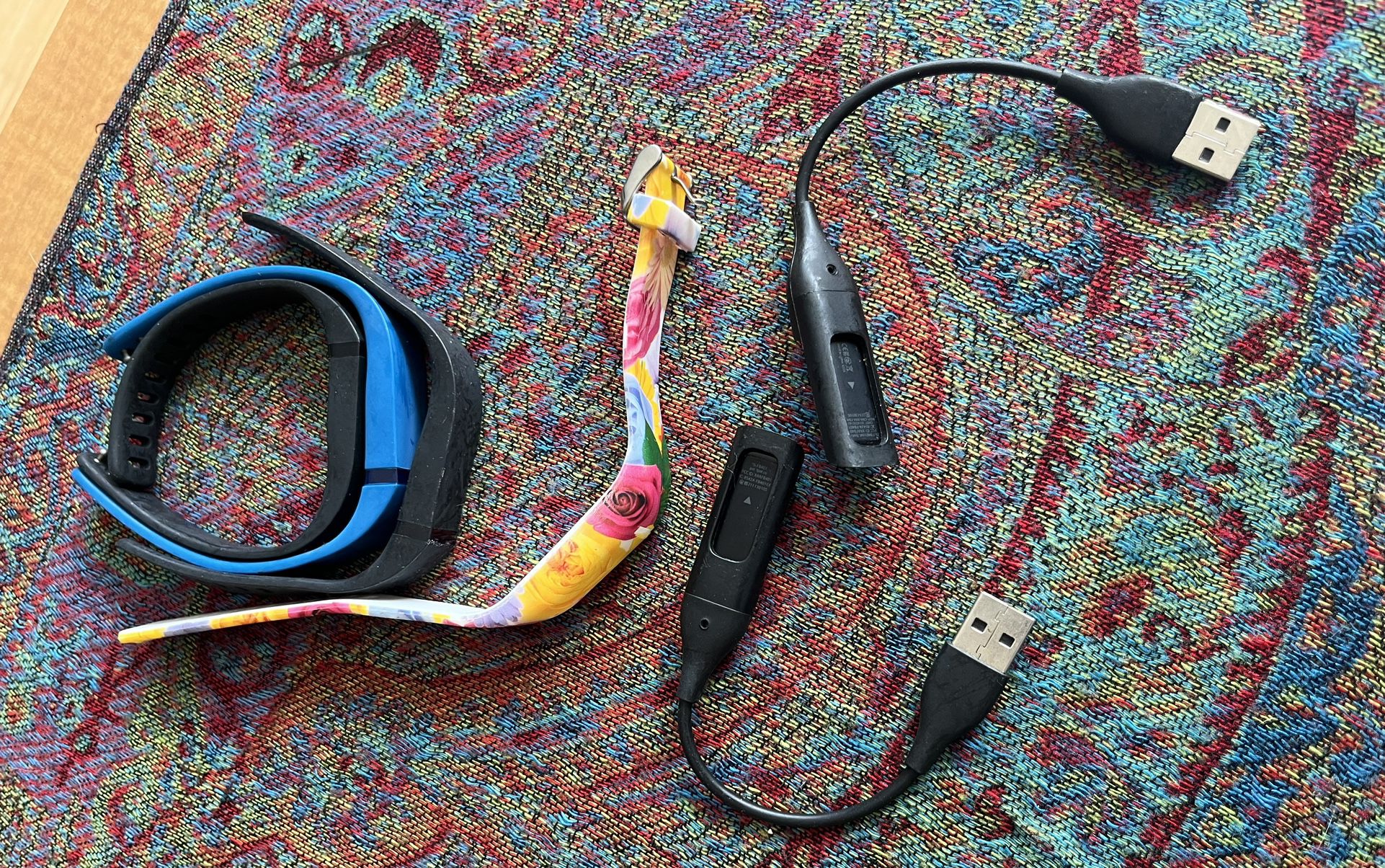 Two Fitbits And Four Straps