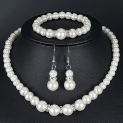 Imitation pearl necklace, bracelet, and earring set, a beautiful wedding photo accessory for brides, and a three-piece pearl gift set for mothers.