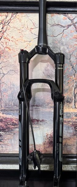 2024 RockShox SID Select + SL 110mm travel. Charger RD2 2 position damper with remote lockout.