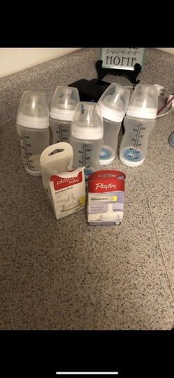 Playtex bottles and drying rack