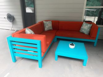 Outdoor L-shaped sectional sofa with matching coffee