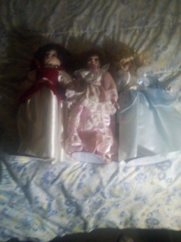 Three Porcelain Dolls $20 Each , Or$40for All Three