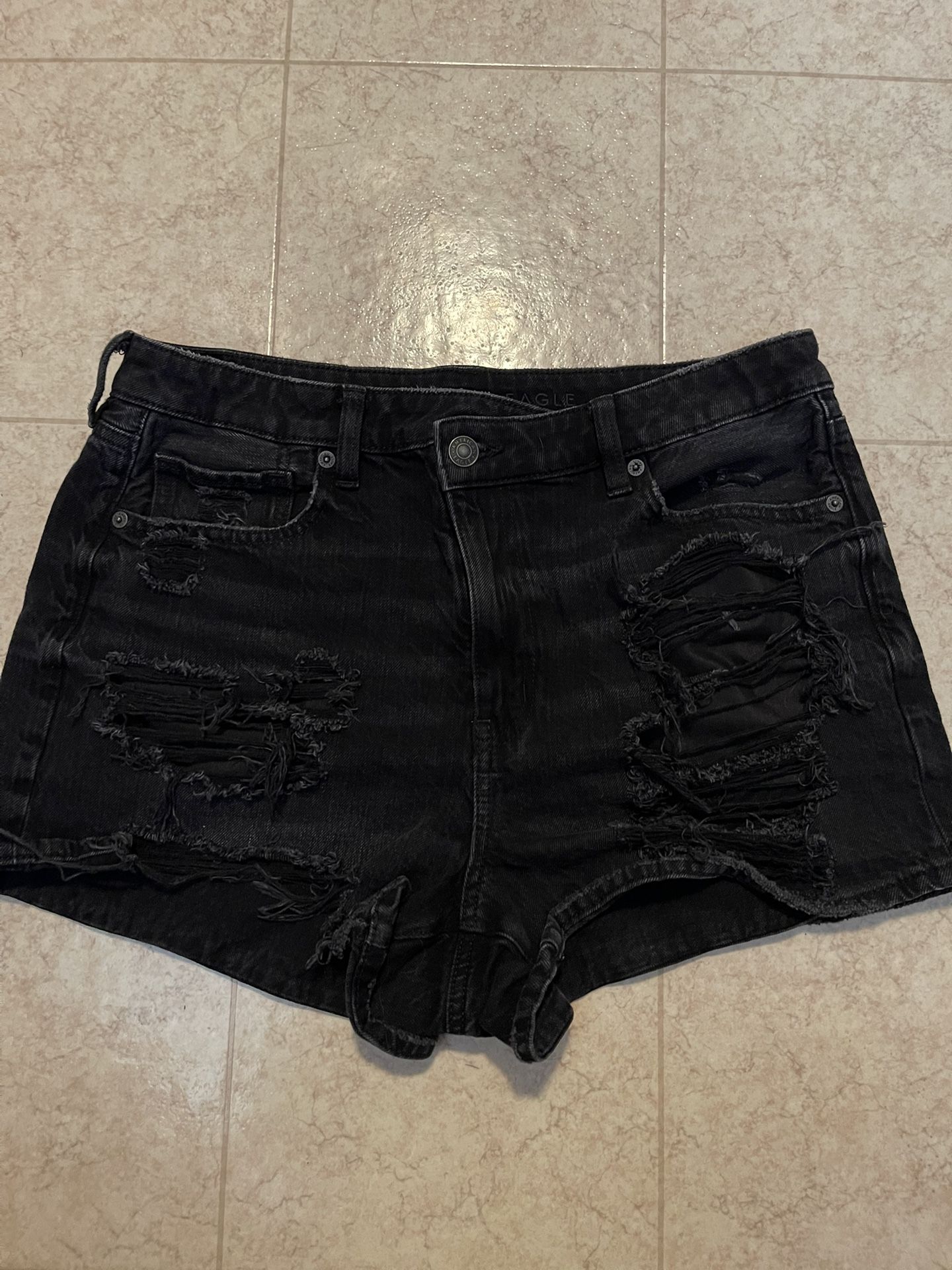 black ripped denim shorts