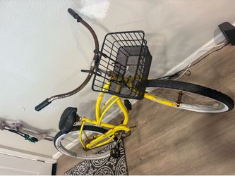 Yellow Firmstrong Urban Lady 26" single-speed beach cruiser bike