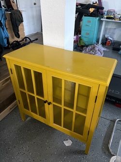 Yellow Wood Cabinet with Glass Doors