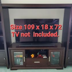 Solid Wood Heavy Duty Entertainment Media Center Shelves TV Stand

Great condition with adjustable shelves. Size is 109 long x 18 deep x 72 height.  F
