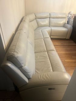Leather  reclining sectional sofa