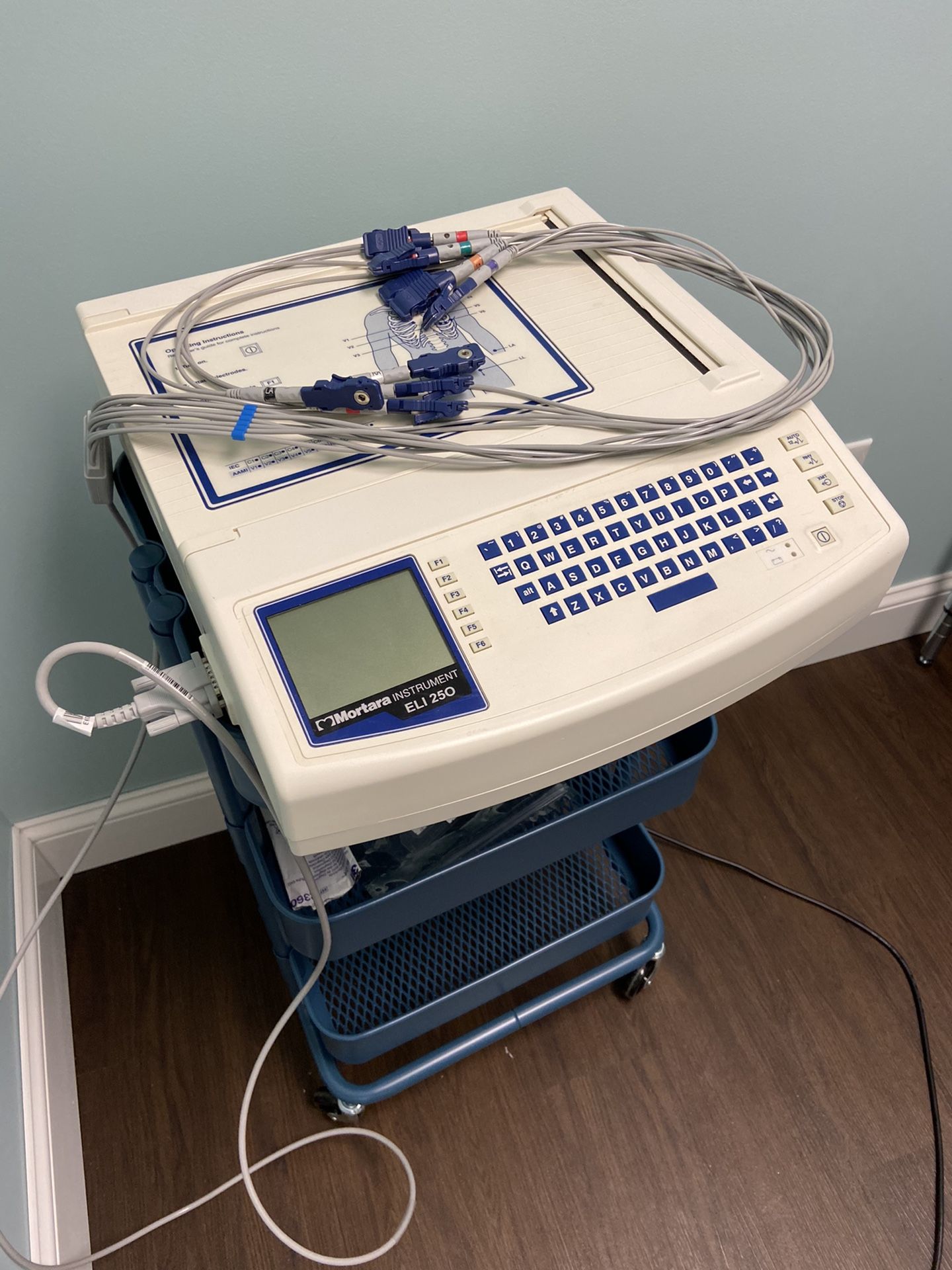 Mortara instrument EKG ECG machine ELI 250 with interpretation for Sale