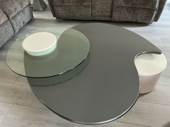 Multi-level comtemporary coffee table with swivel glass