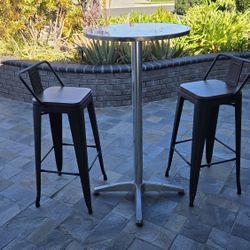 Cocktail Table And Bar Stools 