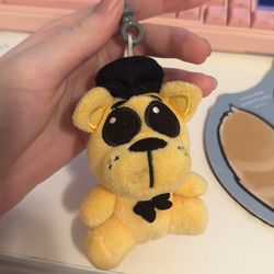 Secret/“exclusive” Five Nights at Freddy’s Golden Freddy keychain