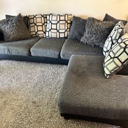 Comfy and stylish Black and tan Sectional 
