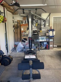 Bowflex Ultimate + 100 lbs Barbell $1