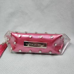 VICTORIA'S SECRET   CLEAR PLASTIC WRISTLET WITH PINK SATIN LINING AND SCATTERED CRYSTALS