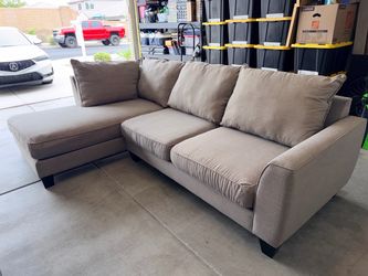 Gray fabric sectional sofa with chase lounge from Living Spaces