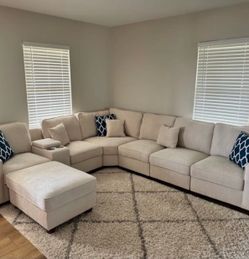 Large Beige Fabric Sectional Sofa with Ottoman