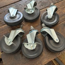 Six industrial 4 inch diameter casters