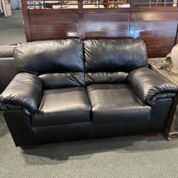 LOVESEAT: Ashley Furniture Black Leather Loveseat SKU SS2LHP
