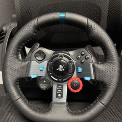 Logitech G29 driving force steering wheels & pedals.
