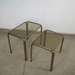 Pair of 1970’s Tubular Brass & Smoked Glass Nesting Side Tables