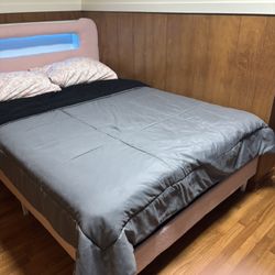 A bed with LED lights