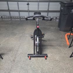 SUNNY Health &Fitness Indoor Cycle!! (Black, Grey, And Red)