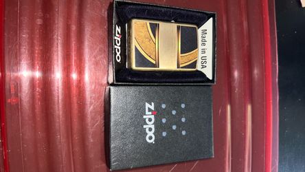 Zippo Gold and Black Brushed Brass Windproof Lighter (Model 28673)