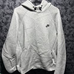 Nike | Tech Fleece Pullover Hoodie Sweatshirt | Gray | Men’s XL  The Nike Tech Fleece Pullover Hoodie Sweatshirt in gray is a versatile and stylish ac