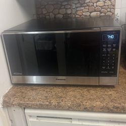 The Panasonic microwave is new. I'm selling it because I bought another smaller one and I don't have much space. This one is big. The Panasonic microw