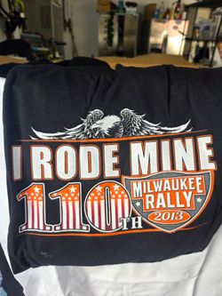 Box full of early 2000's motorcycle rally shirts NWT