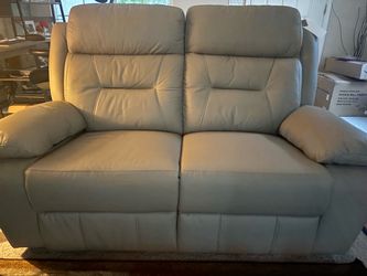 Living Spaces Leather Reclining Loveseat