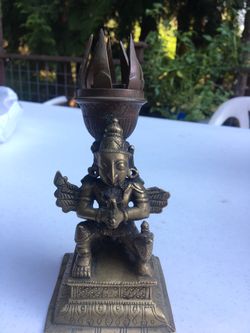 Antique brass Buddha statue